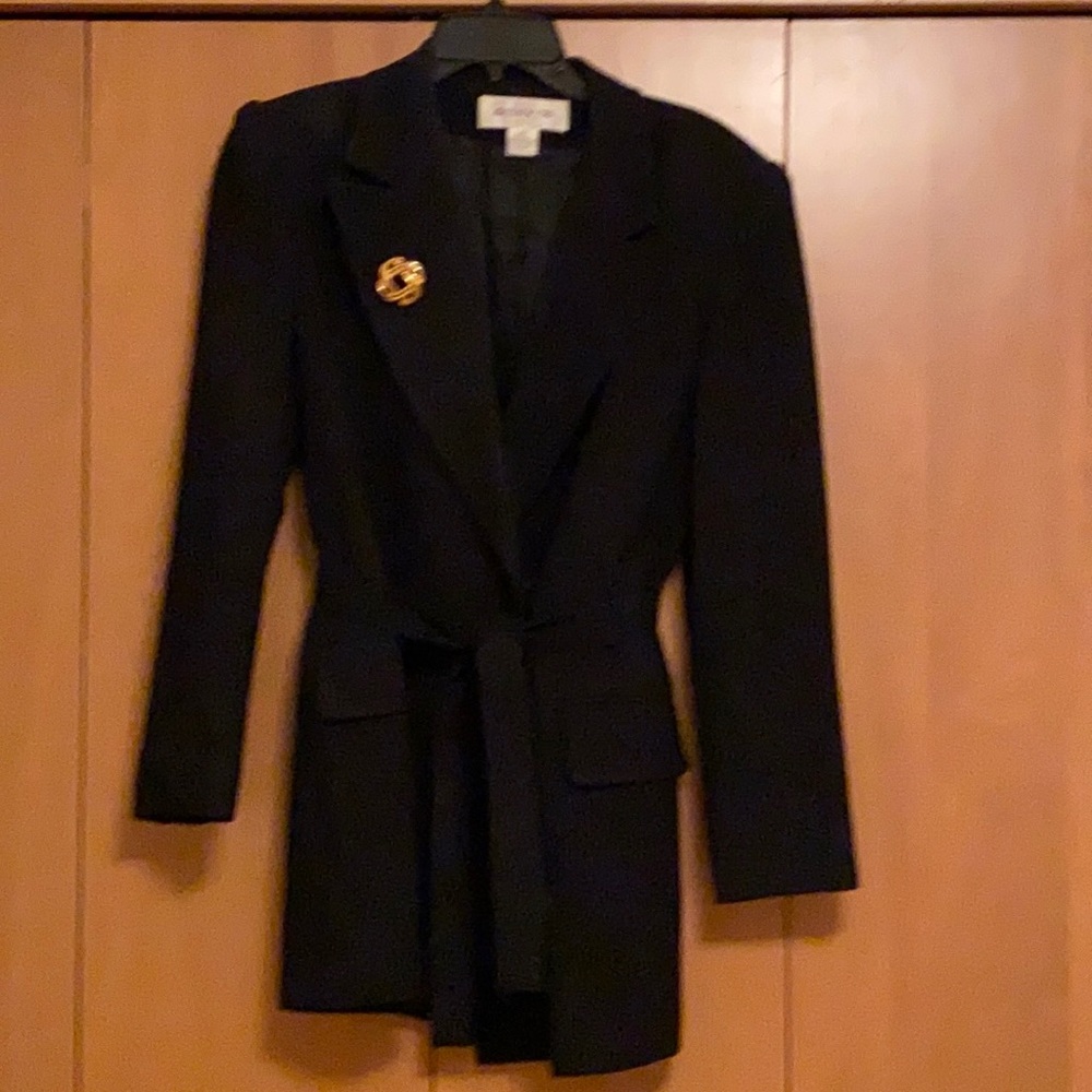 Wrap around jacket with gold pin